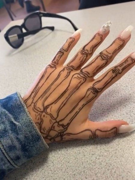skeleton hand tattoo